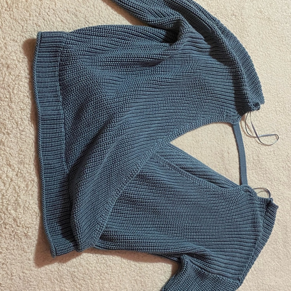 Opened blue shirt